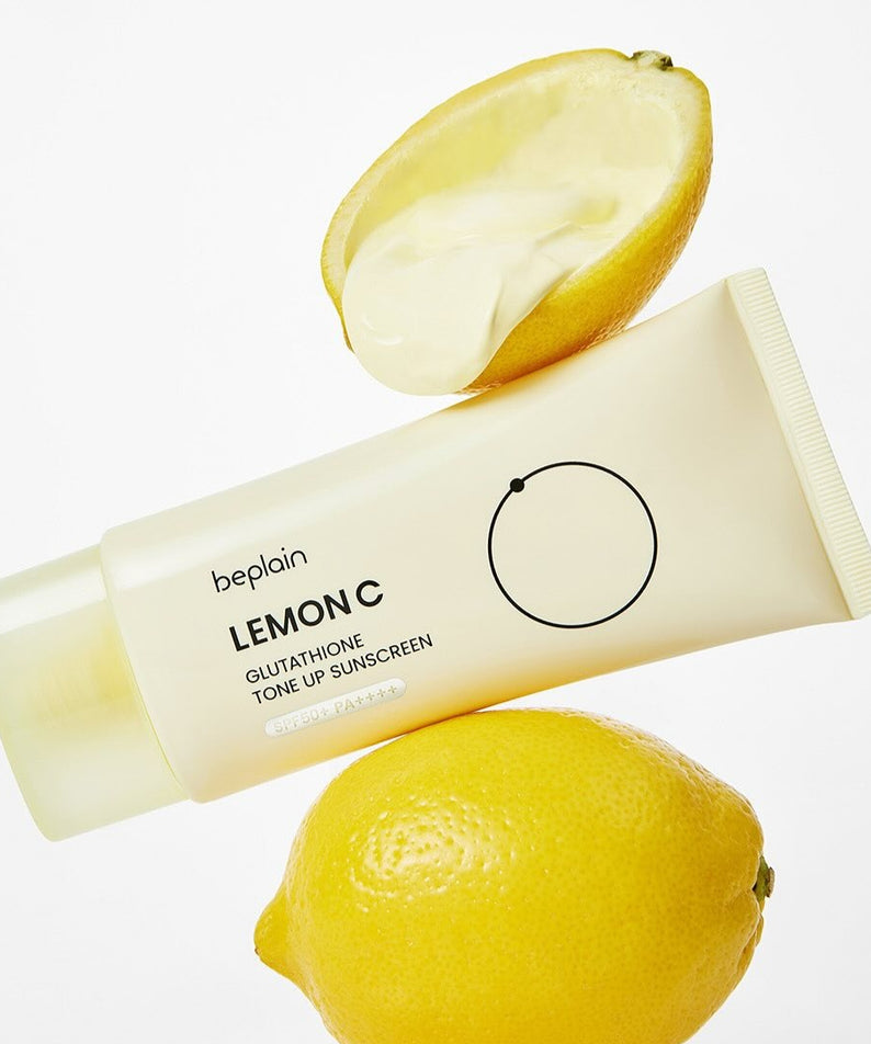 BEPLAIN Lemon Seed Glutathione Tone-up Sun Cream 50ml, tube beplain sur fond blanc, avec citron coupé, pack en gros plan