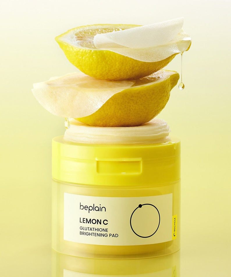 BEPLAIN Lemon Seed Glutathione  Brightening Pads 70 Sheets : pads lumineux à la marque beplain, citrons en arrière-plan.