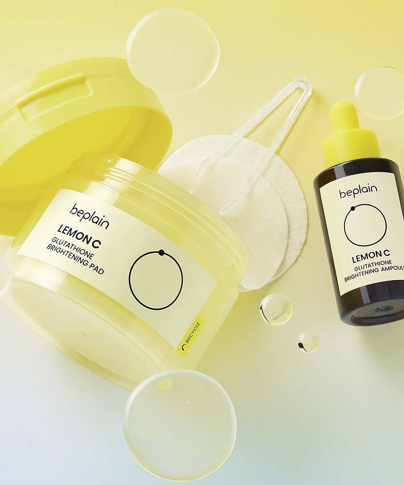 BEPLAIN Lemon Seed Glutathione  Brightening Pads 70 Sheets de beplain, pack citron et capsules sur fond jaune clair.