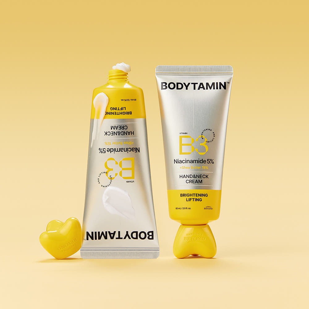 BEYOND Bodytamin B3 Hand&Neck Cream 60ml, crème mains et cou de la marque BEYOND sur fond jaune