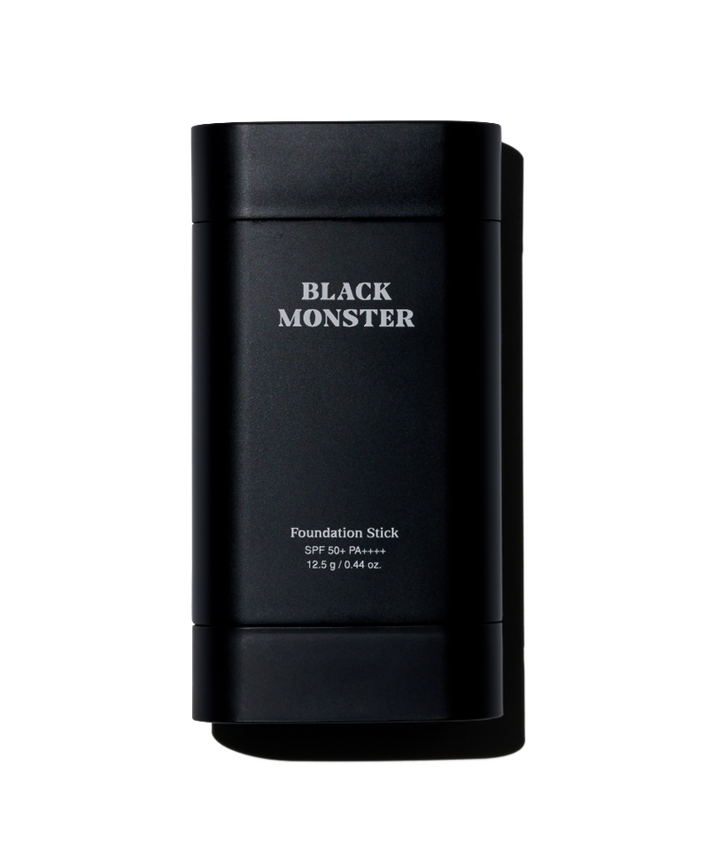BLACK MONSTER Foundation Stick, flacon noir sur fond blanc; produit maquillage de la marque BLACK MONSTER.