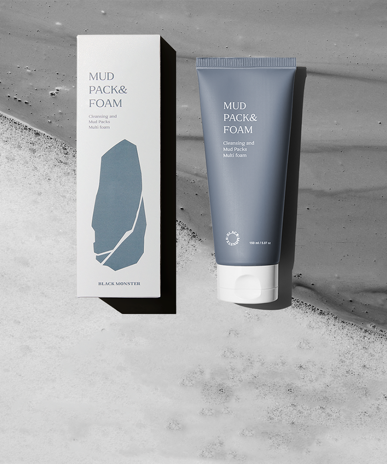 BLACK MONSTER Mud Pack & Foam 150ml, pack et tube sur fond béton gris, contexte visuel produit marque noire.