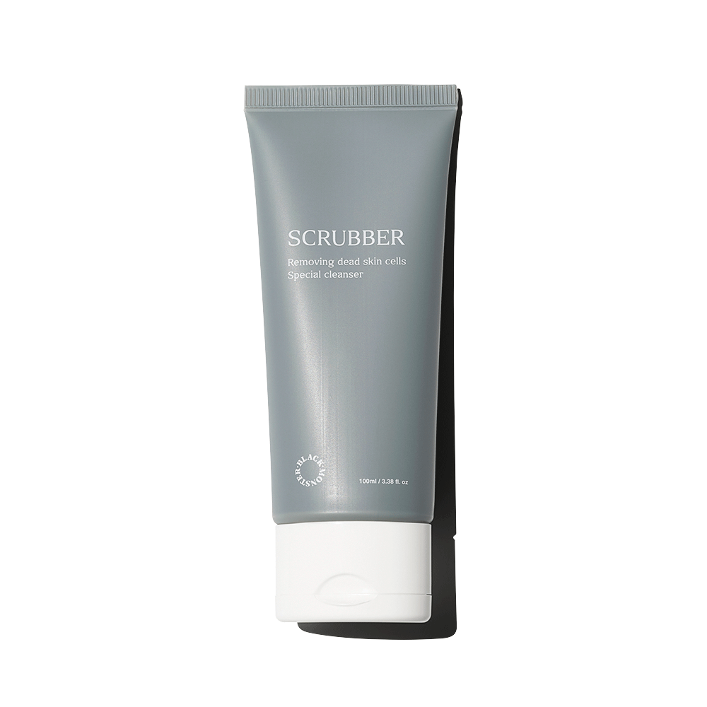BLACK MONSTER Scrubber 100ml, tube de nettoyant exfoliant sur fond clair, marque visible SCRUBBER.