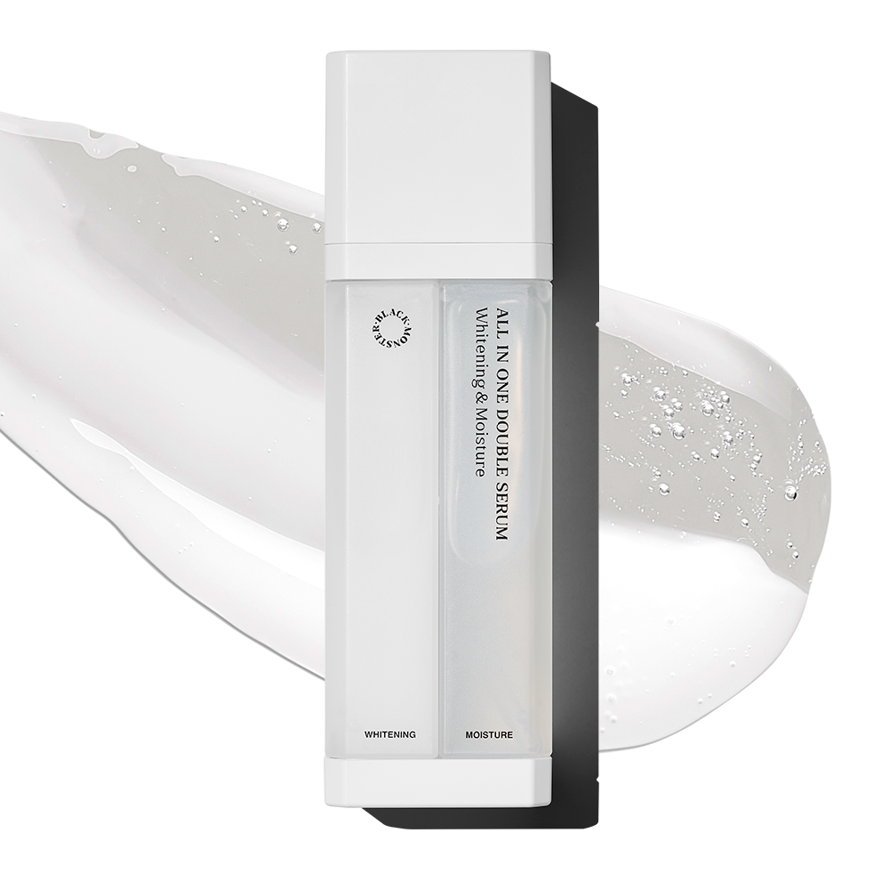 BLACK MONSTER White All-in-One Double Serum 75ml, sérum double en flacon blanc sur fond crème, gouttes lumineuses.