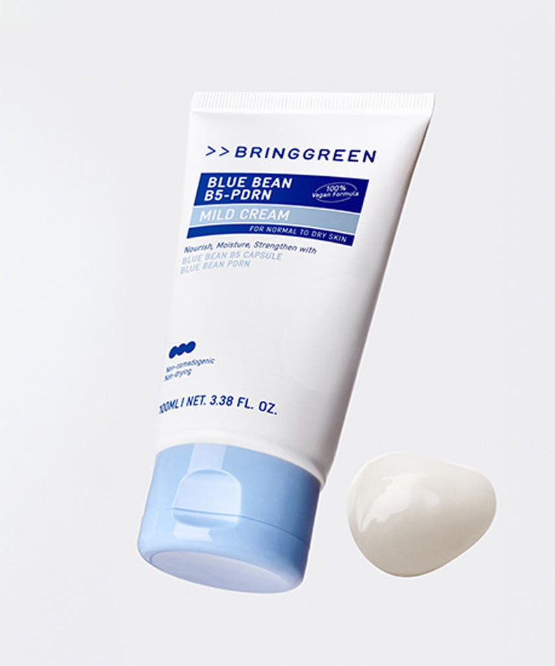BRINGGREEN Blue Bean B5-PDRN Mild Cream 100ml de la marque BRINGGREEN, crème douce en tube bleu sur fond clair.