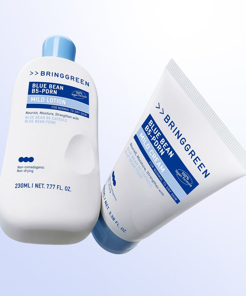 BRINGGREEN Blue Bean B5-PDRN Mild Cream 100ml, crème apaisante de la marque, vue sur fond clair, flacons et tube bleus.