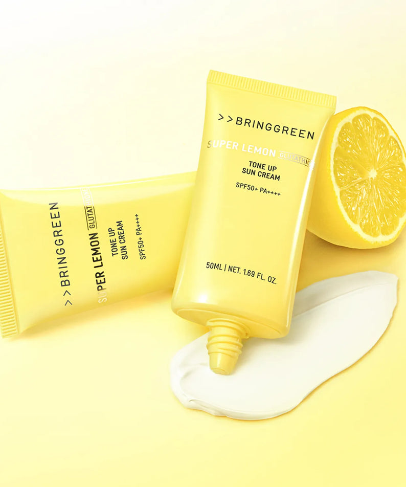 BRINGGREEN Super Lemon Glutathione Tone-Up Sun Cream 50ml+50ml SPF 50+ / PA++++, tube jaune et citron sur fond clair