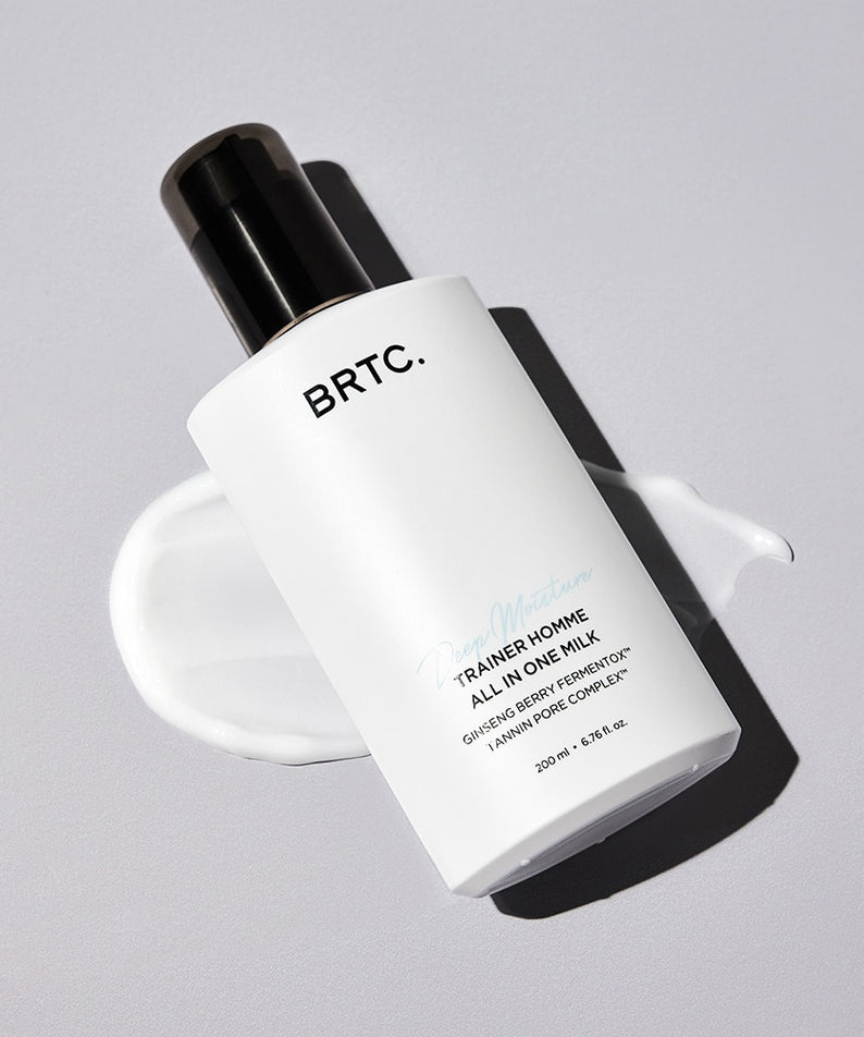 BRTC Trainer Homme ALl-in-One Milk 200ml, flacon crème blanche BRTC sur fond clair, contexte beauté homme.
