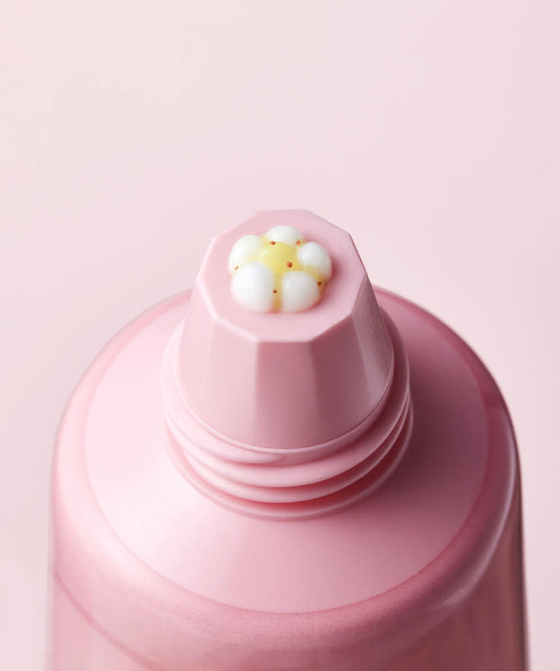 Décris l'image en français : BRTC Time 8 LIft-Toning Collagen Cream 80ml de BRTC, flacon crème rose sur fond clair.