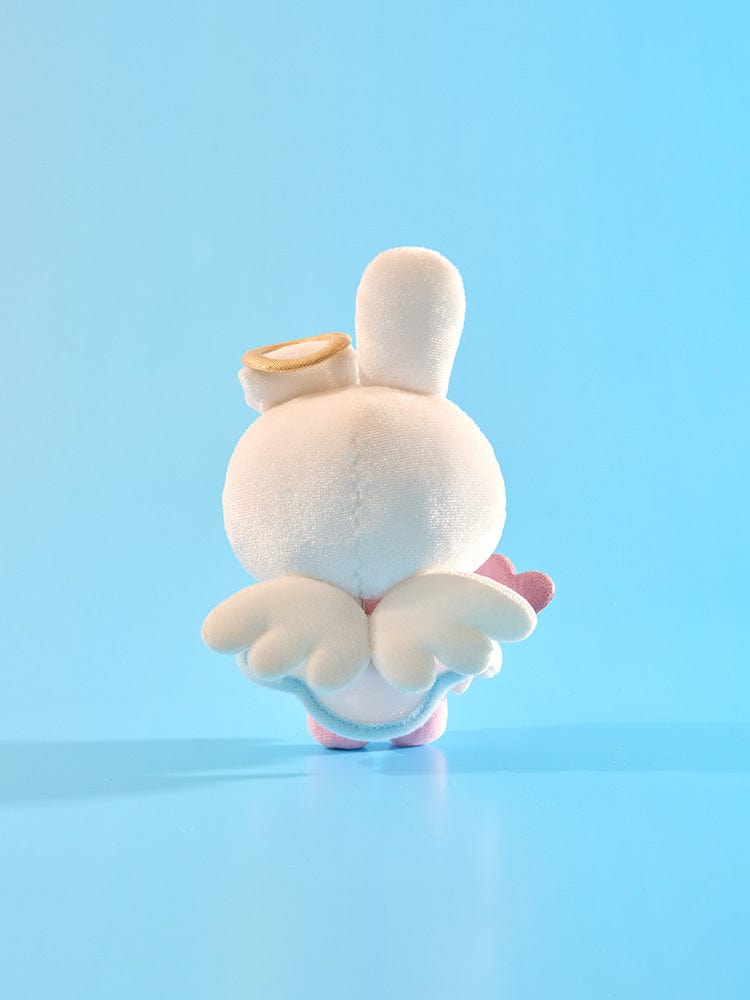 BT21 COOKY ANGEL PLUSH ANGEL & VILLAIN, peluche officielle LINE FRIENDS sur fond bleu ciel, détail de l’ange.