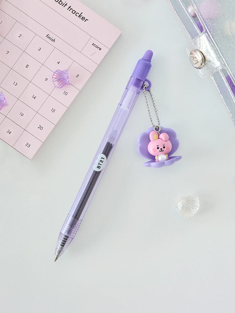 BT21 COOKY BABY PEARL FIGURINE GEL PEN LINE FRIENDS : stylo gel violet avec figurine COOKY, sur agenda et feuilles.