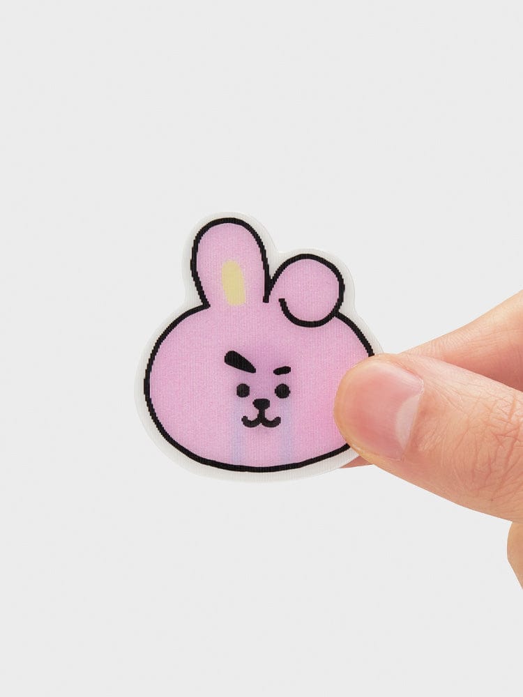 BT21 COOKY LENTICULAR 3D MAGNET 2024 SEASON'S GREETINGS : magnet 3D officiel LINE FRIENDS, main tenant l’aimant sur fond clair.