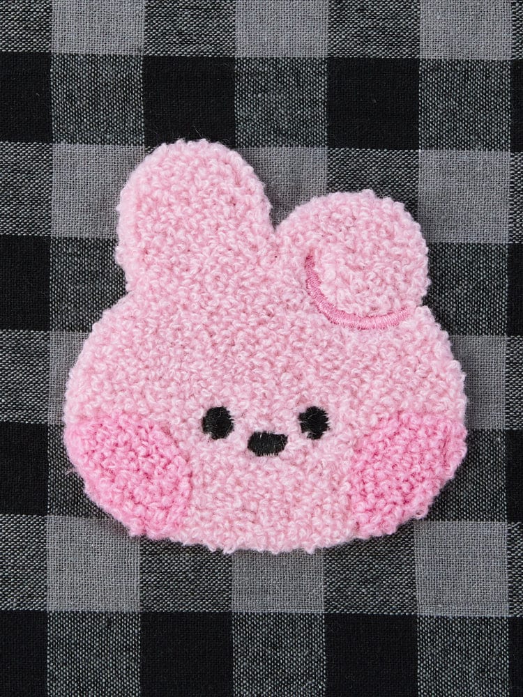 BT21 COOKY minini STRING POUCH BASIC : pochette textile rose COOKY, motif lapin musclé sur tissu à carreaux noir et gris.