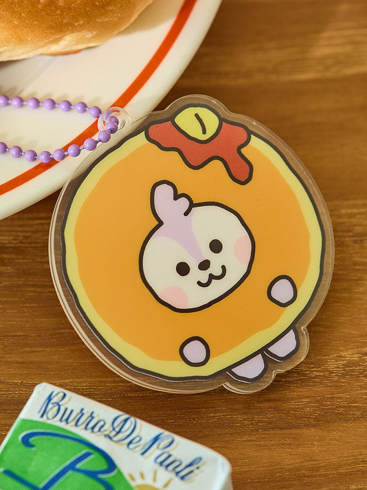 BT21 MANG BABY ACRYLIC KEYRING BAKERY SHOP : porte-clés acrylique MANG devant pâtisserie, sur table bois.