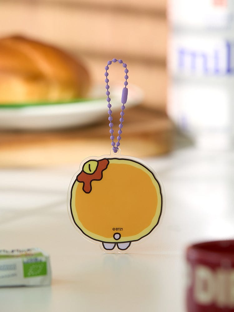 BT21 MANG BABY ACRYLIC KEYRING BAKERY SHOP : porte-clés acrylique MANG devant une scène de boulangerie, fan K-pop LINE FRIENDS.