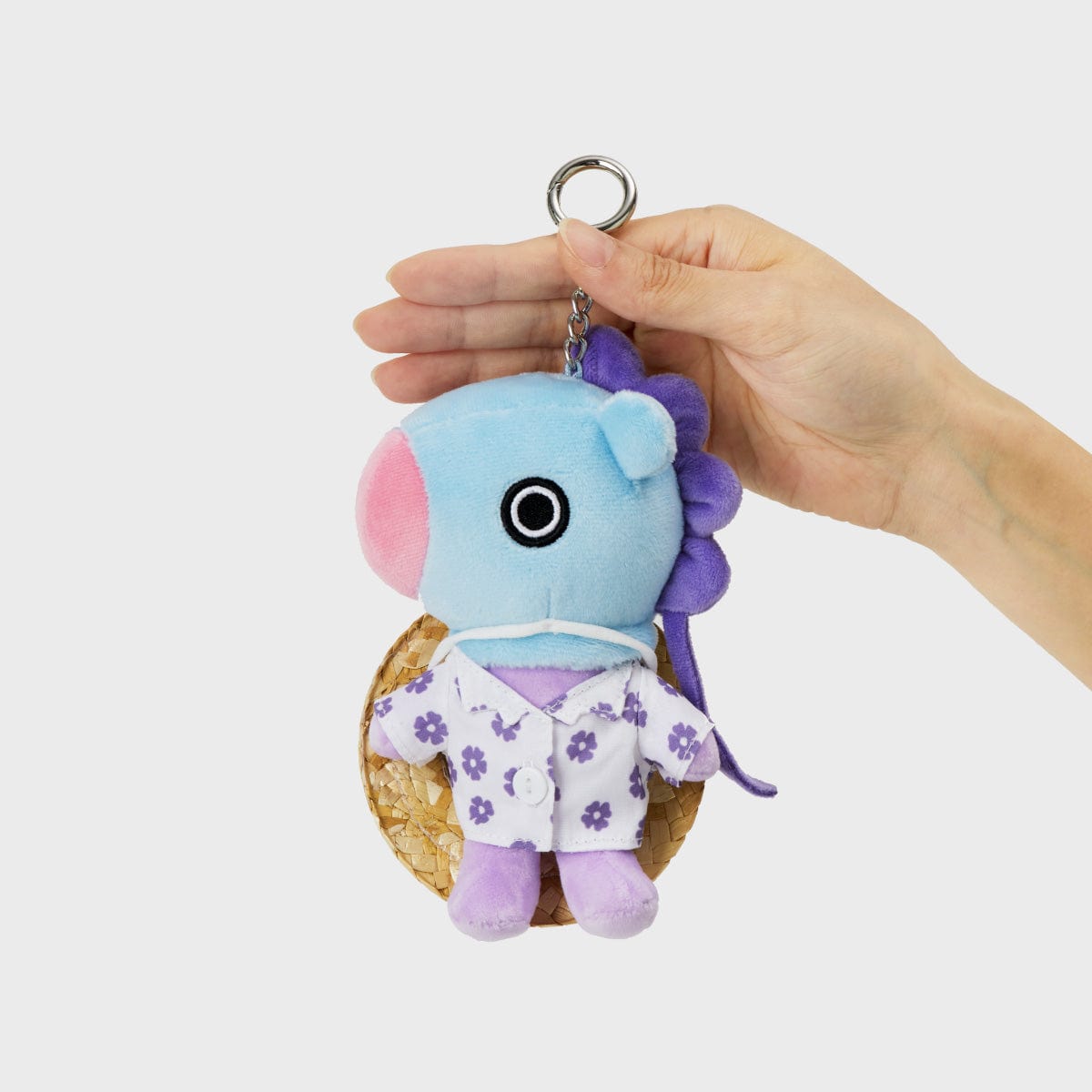 BT21 MANG SUMMER LANE BODY BAG CHARM, porte-clés LINE FRIENDS en main, MANG poney danseur masqué sur fond clair.