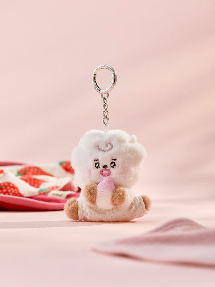 BT21 RJ BABY PLUSH KEYRING NEWBORN SEASON 2 porte-clés peluche alpaga RJ LINE FRIENDS, sur fond rose pastel.