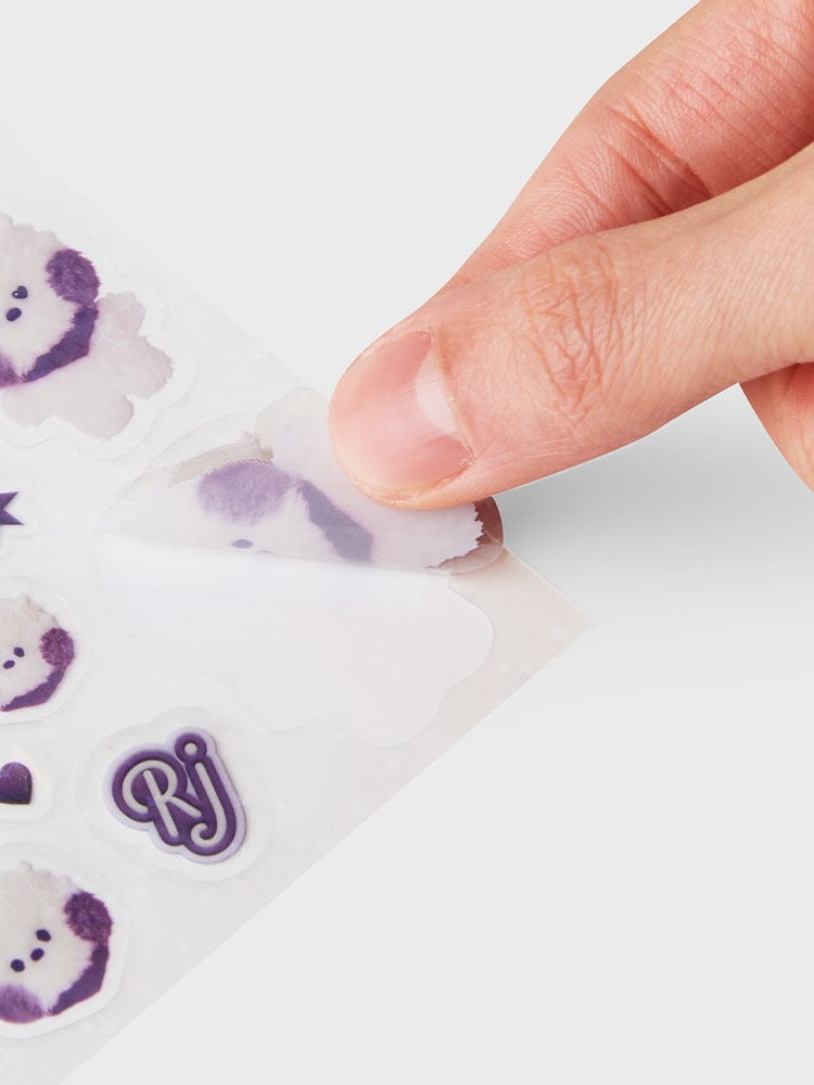 BT21 RJ minini STICKERS PURPLE OF WISH EDITION LINE FRIENDS : stickers violets RJ, main qui décolle un autocollant