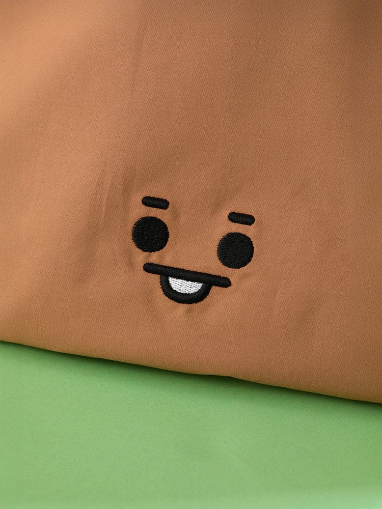 BT21 SHOOKY BABY BASIC ECO BAG : pochette éco en tissu marron avec visage SHOOKY, fond vert, LINE FRIENDS.
