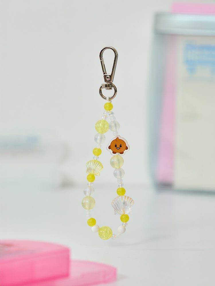 BT21 SHOOKY BABY PEARL BEADED KEYRING de LINE FRIENDS : porte-clés perles jaunes SHOOKY sur fond pastel, idée cadeau K-pop.