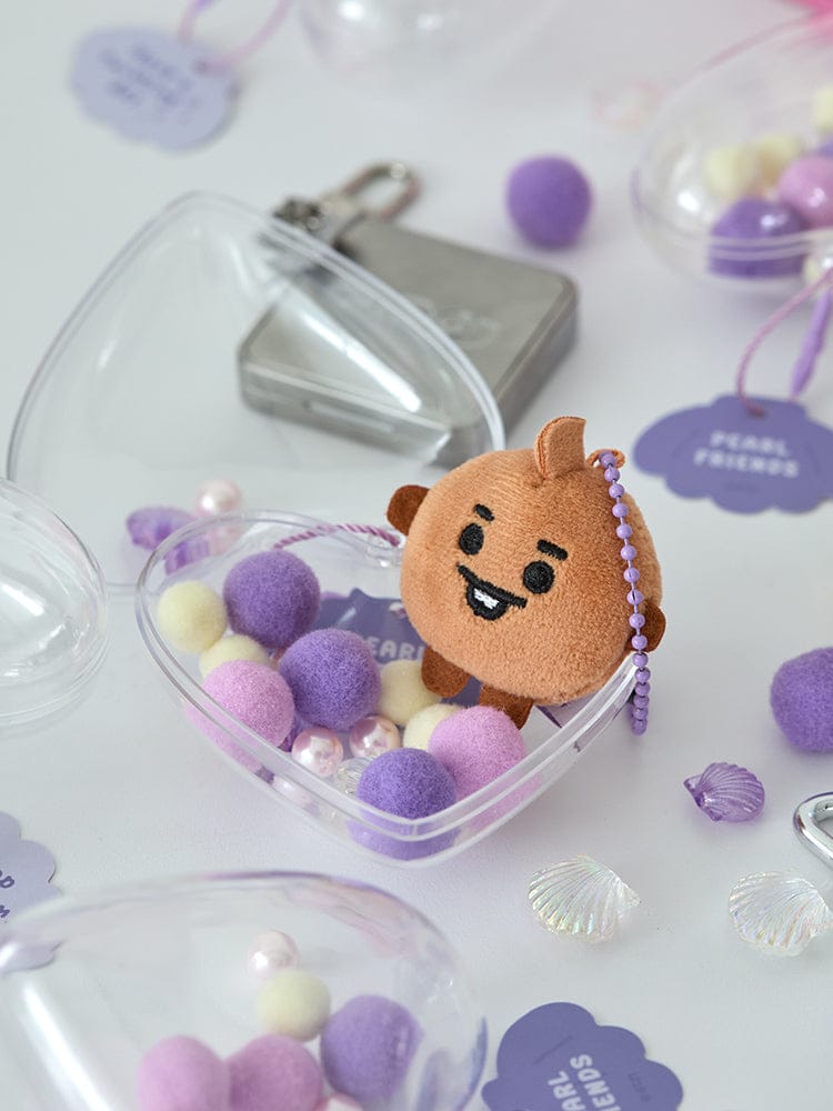BT21 SHOOKY BABY PEARL PLUSH KEYRING LINE FRIENDS : porte-clés SHOOKY avec perles, sur fond violet et accessoires.