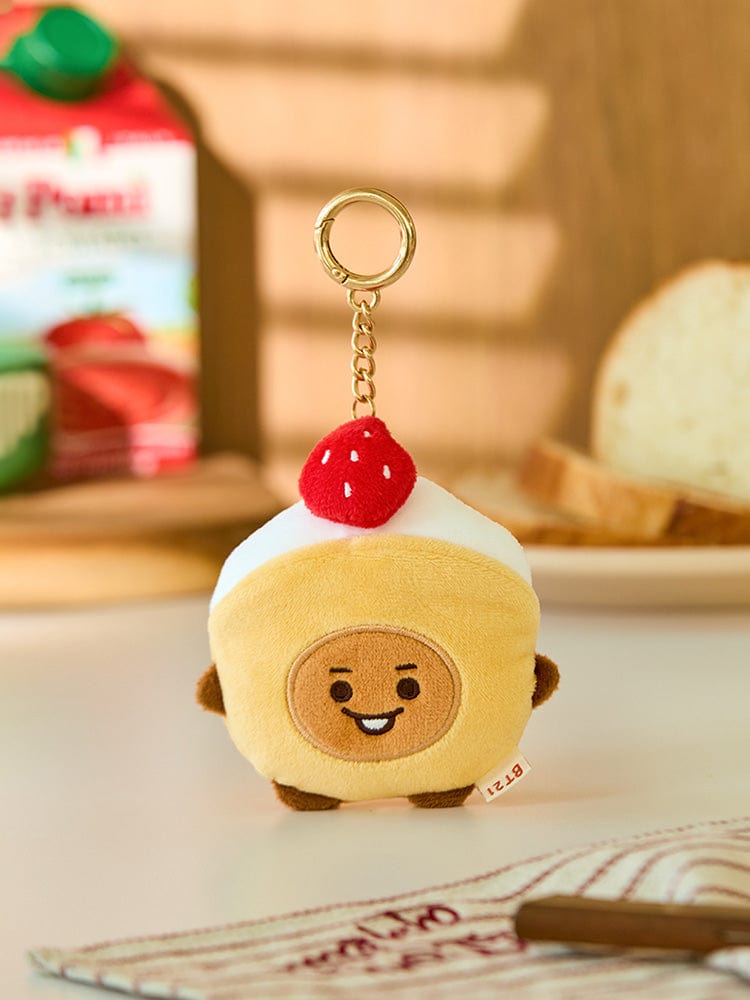 BT21 SHOOKY BABY PLUSH KEYRING BAKERY SHOP : porte-clés peluche SHOOKY sur comptoir de boulangerie, décor K-pop LINE FRIENDS.