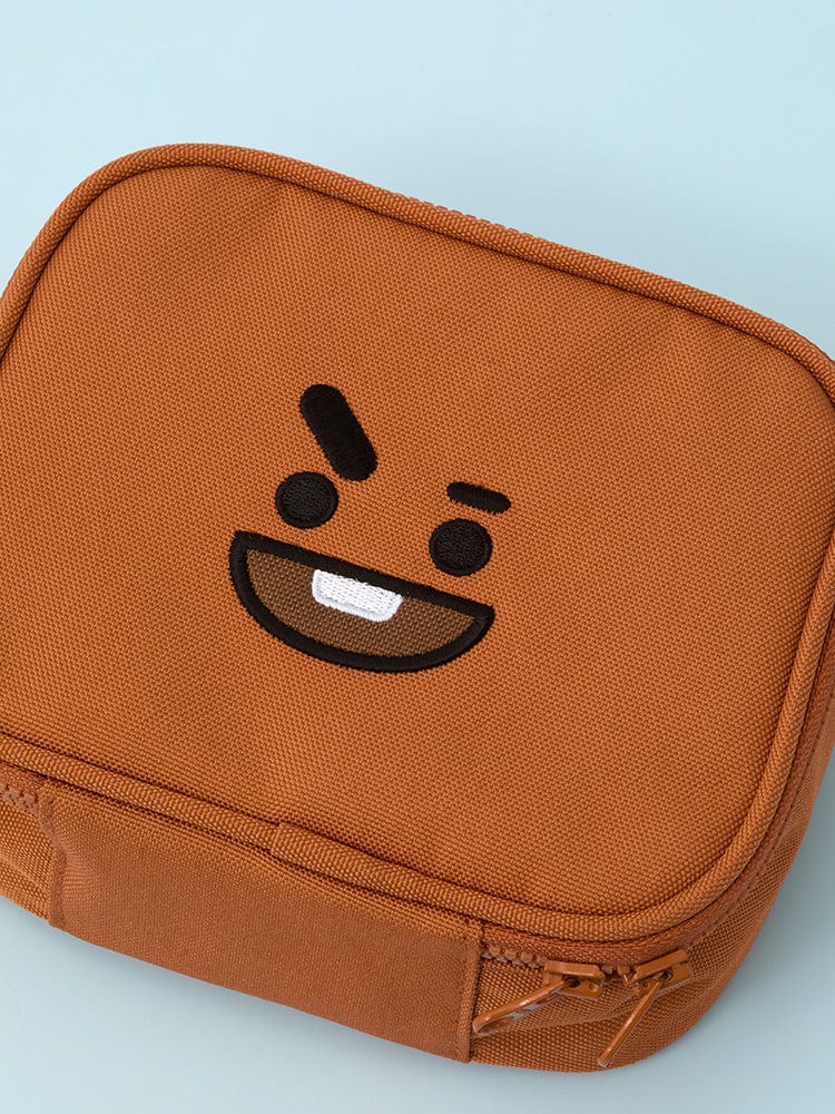 BT21 SHOOKY BASIC MULTI POUCH (S) LINE FRIENDS : pochette orange avec visage SHOOKY, vue rapprochée sur tissu.