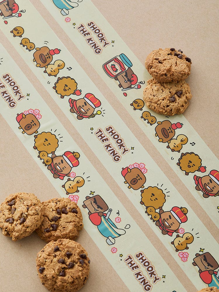 BT21 SHOOKY THE KING PACKING TAPE de LINE FRIENDS : ruban illustré Shooky pour emballer, cookies et carton sur fond beige