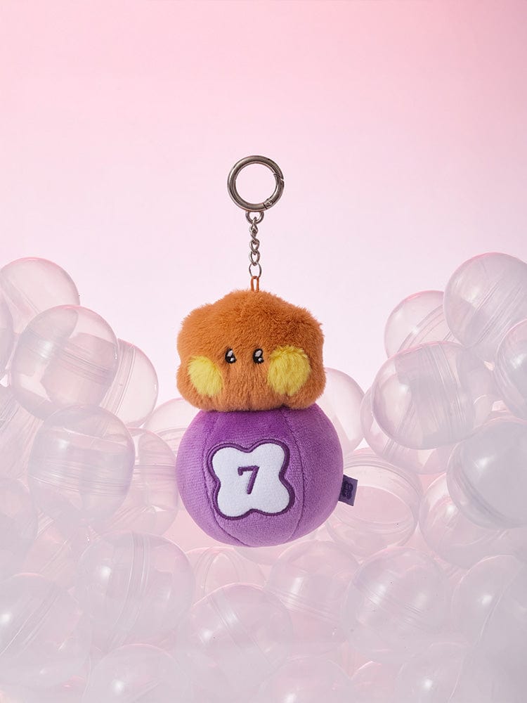 BT21 SHOOKY minini PLUSH KEYRING LUCKY GATCHA, porte-clés officiel sur fond rose avec peluche SHOOKY entourée de bulles