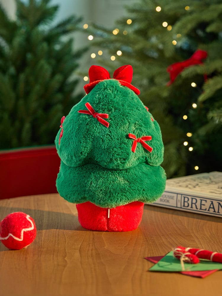 BT21 SHOOKY minini TREE PLUSH PETITE HOLIDAY peluche verte sur table, décor sapin de Noël, marque BT21