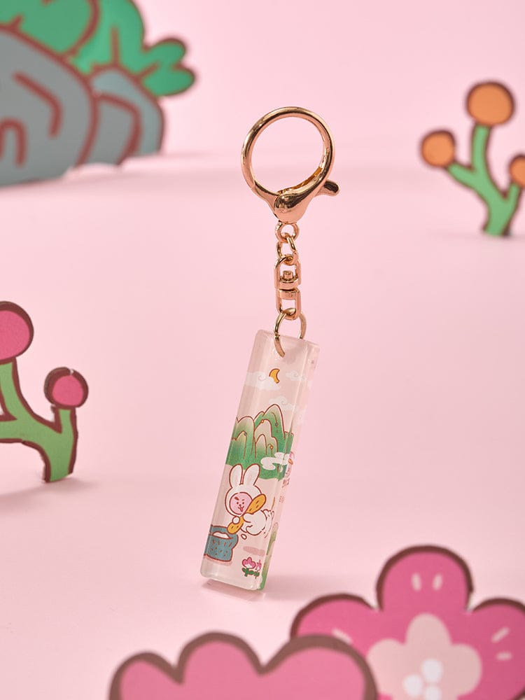 BT21 STICK ACRYLIC KEYRING K-TOKKI, porte-clés en acrylique officiel sur fond rose avec personnages BT21, LINE FRIENDS