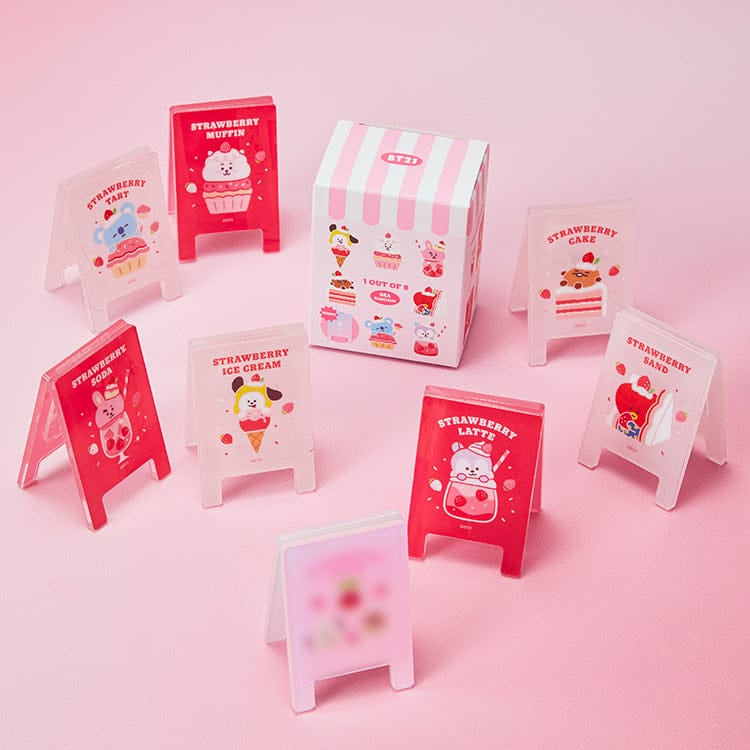 BT21  Strawberry Party Random Acrylic Multi Clip (1 Piece) de la marque BT21, clips acryliques sur fond rose pastel.