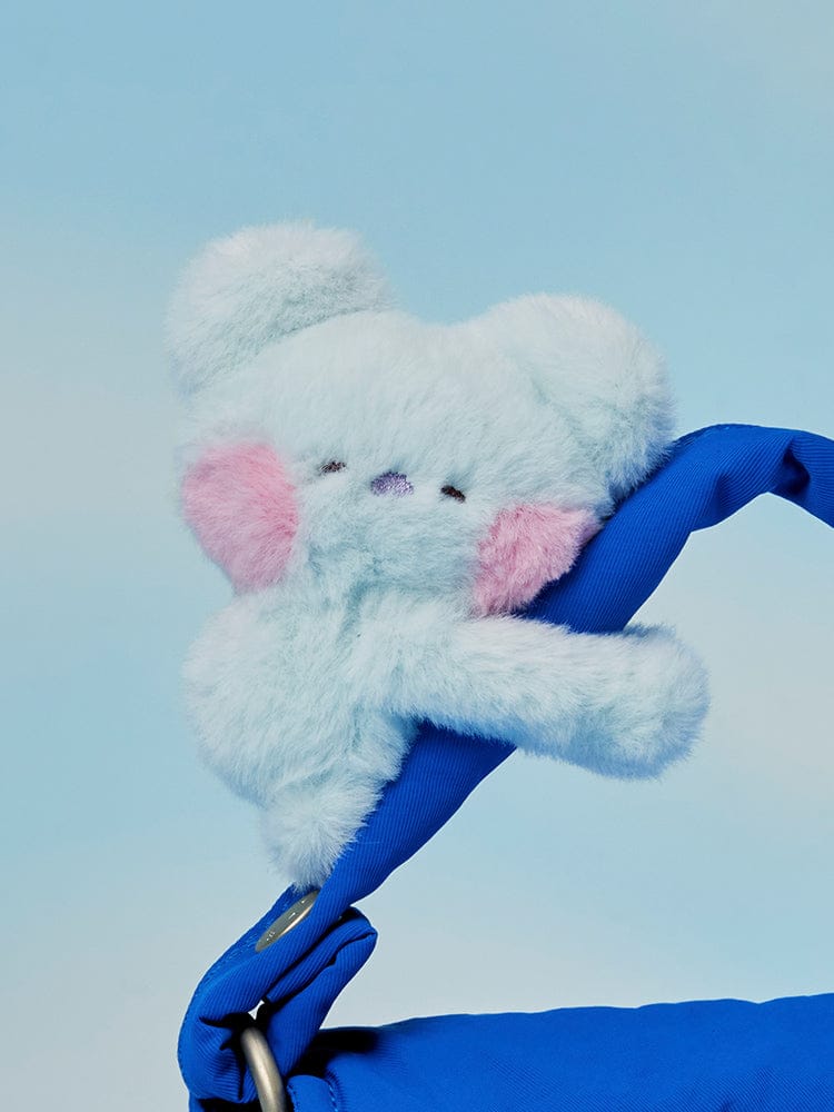 BT21 mini minini MAGNET PLUSH KEYRING HUG ME, porte-clés LINE FRIENDS : peluche mini minini câline bleue sur fond bleu ciel.