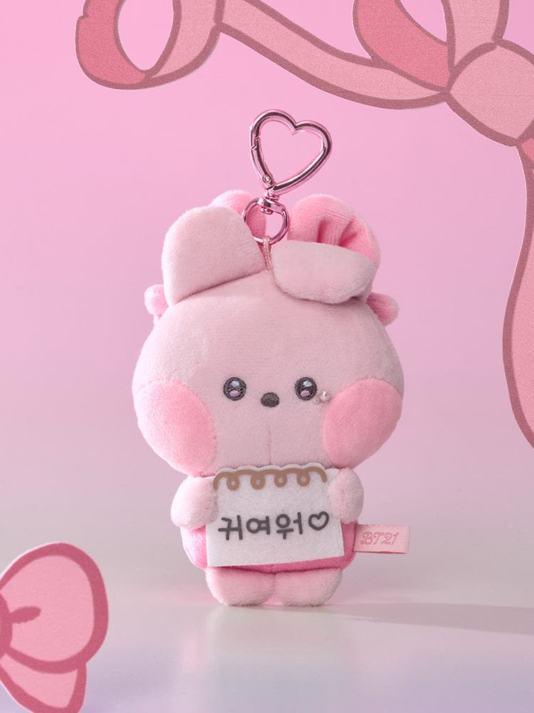 BT21 minini I LOVE YOU MESSAGE BOOK PLUSH KEYRING RIBBONED U, porte-clés plush rose avec ruban, fond rose LINE FRIENDS
