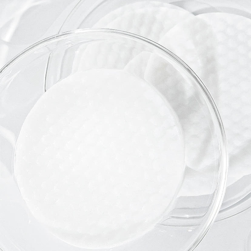 CELIMAX Ji Woo Gae One Step Body Brightening Pad 60 Pads, disques blancs sur tissu blanc, visuel produit de la marque