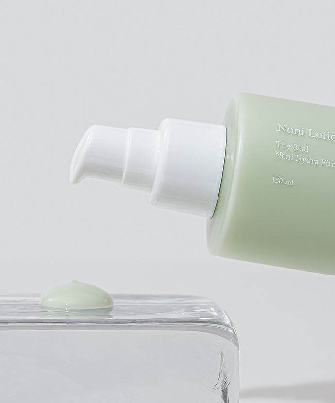 CELIMAX The Real Nino Hydra Firming Lotion 150ml en contexte visuel sur fond clair, flacon crème vert et pompe blanche.