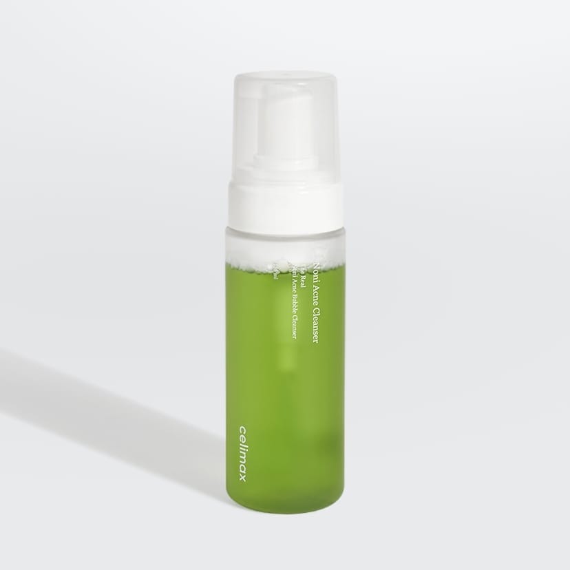 CELIMAX The Real Noni Acne Bubble Cleanser 155ml, flacon vert sur fond blanc, marque CELIMAX, nettoyant anti-acné.