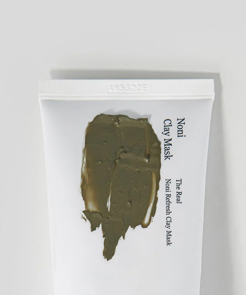 Tube de 120g de CELIMAX The Real Noni Refresh Clay Mask avec argile visible sur l'emballage.