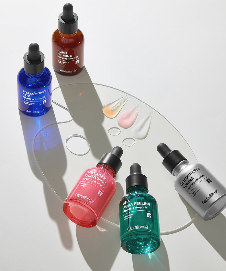 CENTELLIAN 24 Glutathione Toning Boosting Ampoule 30ml 5 Types, ampoules sur fond blanc avec gouttes/produits cosmétiques.