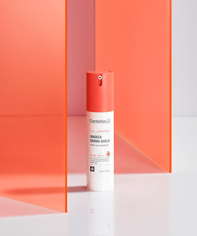 CENTELLIAN 24 Madeca Derma Sheild Safe Sun Essence 40ml de la marque CENTELLIAN 24, flacon sur fond orange.