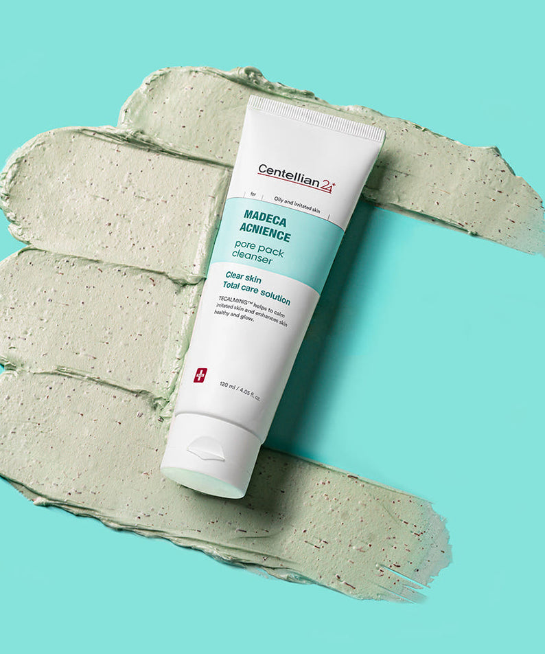 CENTELLIAN 24 Madeca Acnience Pore Pack Cleanser 120ml, tube sur crème verte, fond turquoise, marque visible.