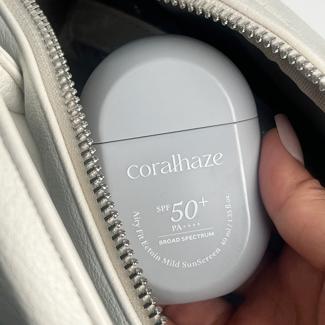 CORALHAZE Airy Fit Ection Mild Sunscreen 40ml, flacon SPF50 PA+++ dans une pochette zippée, photo produit en gros plan.