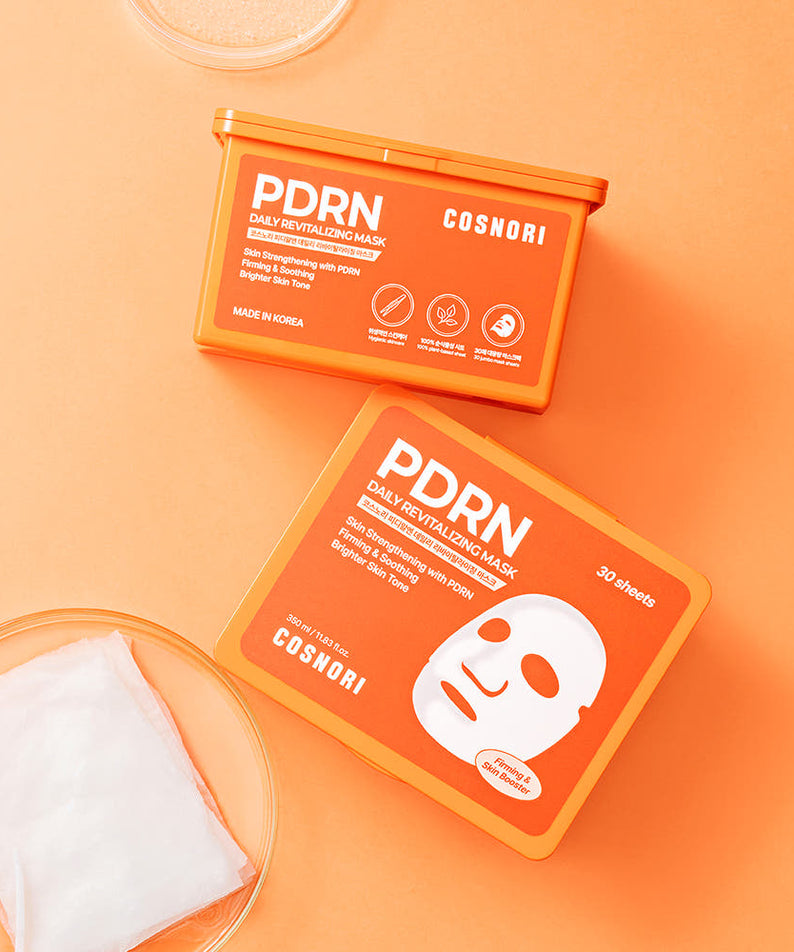 COSNORI PDRN Daily Revitalizing Mask 30 sheets, coffret de masques sur fond orange, marque COSNORI en gros plan.
