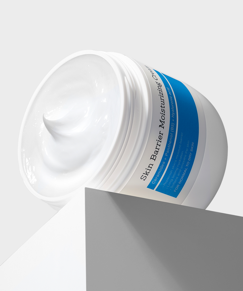Décris l'image en français : COSRX Skin Barrier Moisturizing Cream 450ml de la marque COSRX, pot blanc sur fond clair