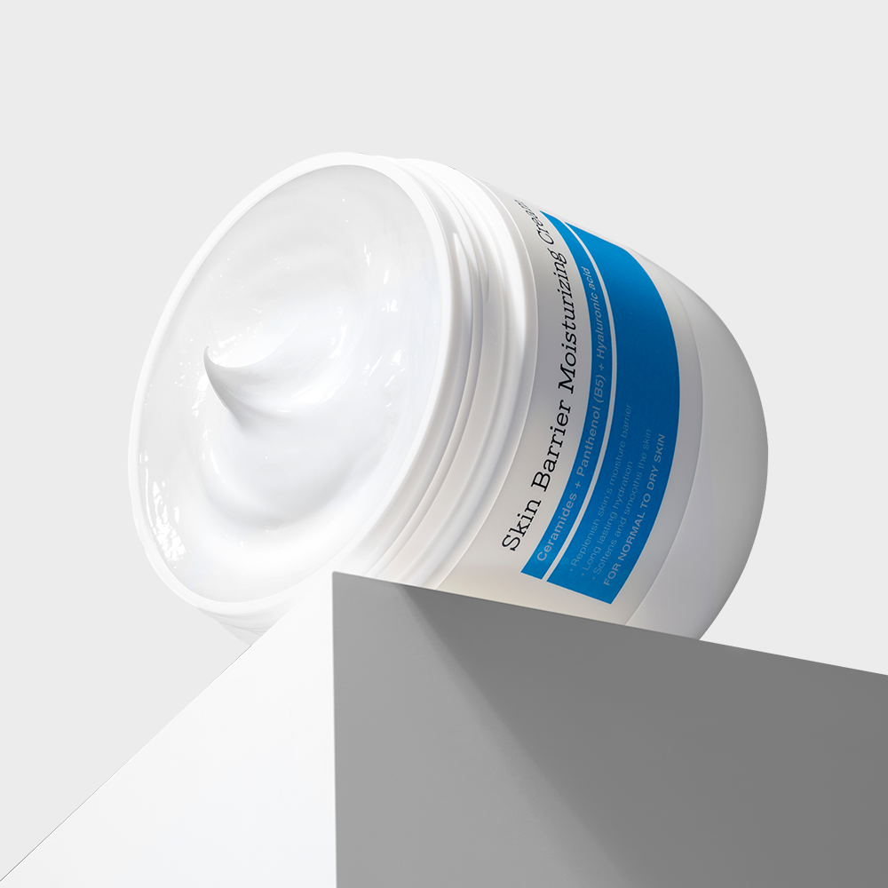 Décris l'image en français : COSRX Skin Barrier Moisturizing Cream 450ml de la marque COSRX, pot blanc sur fond clair