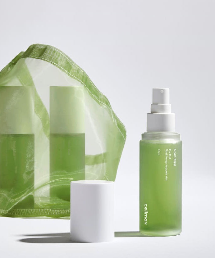 Celimax The Real Noni Energy Ampoule 50ml : sérum vert Celimax sur fond clair, flacon pompe & étui noni.