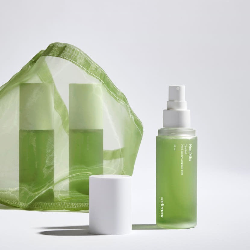 Celimax The Real Noni Energy Ampoule 50ml : sérum vert Celimax sur fond clair, flacon pompe & étui noni.