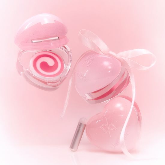 DASIQUE Daisy Candy Rolling Pot de la marque DASIQUE, pot en forme de fleur daisies rose avec motif sucette, fond rose