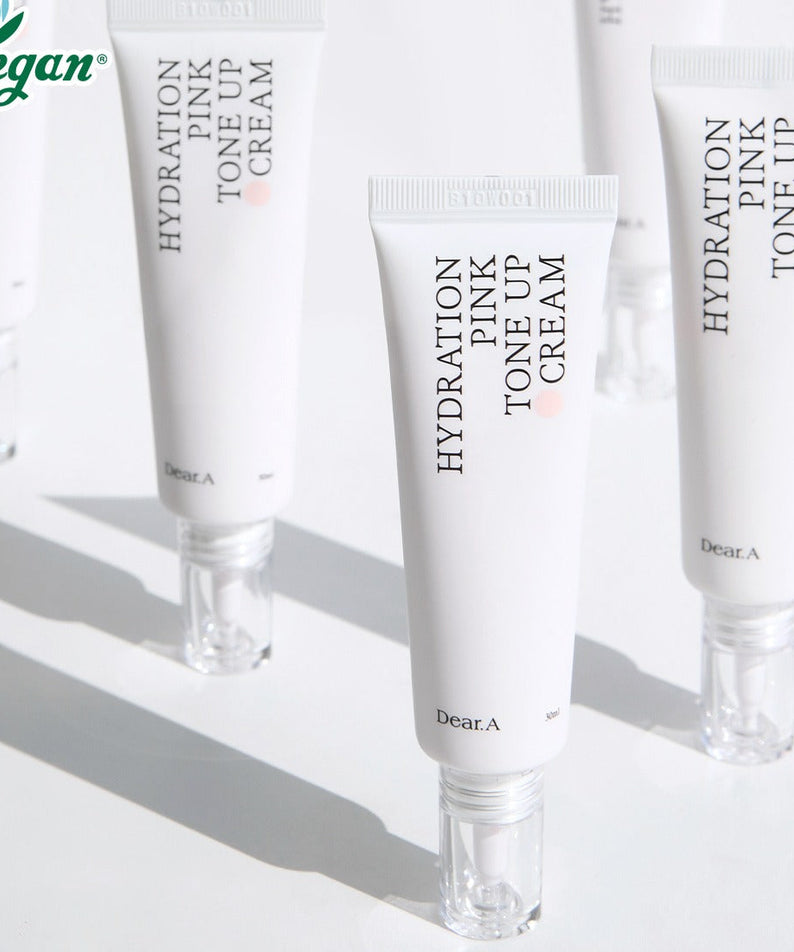 DEAR.A Hydration Pink Tone-Up Cream 30ml de la marque Dear.A, tubes roses sur fond blanc en studio (gros plan).