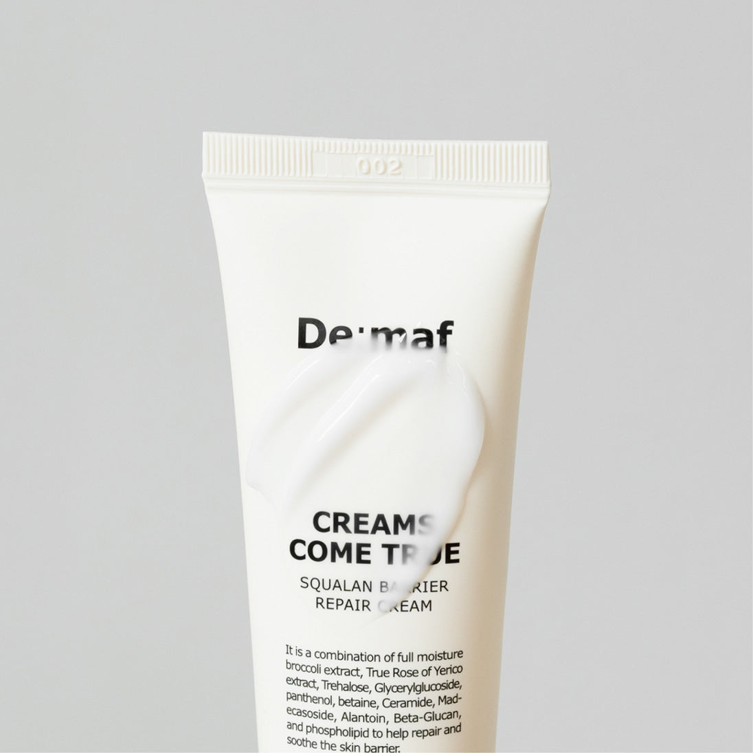 DE:MAF Creamscumtrue Squalane Barrier Repair Cream 50ml de De-maf, tube crème blanc sur fond clair